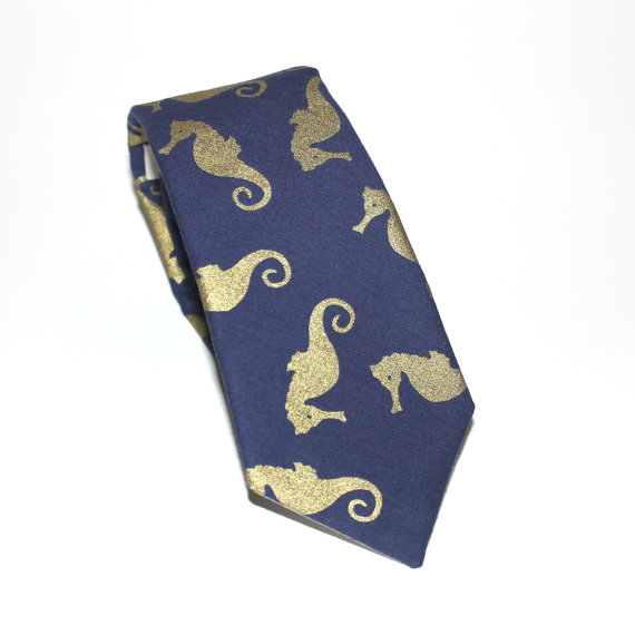 This fancy tie is beautifully gilded in golden Hippocampus. Available at etsy for $49.50